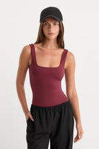 THE SCULPTING MODERN TANK BODYSUIT BERRY NOIR