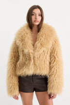 THE FAUX FUR COAT SAND