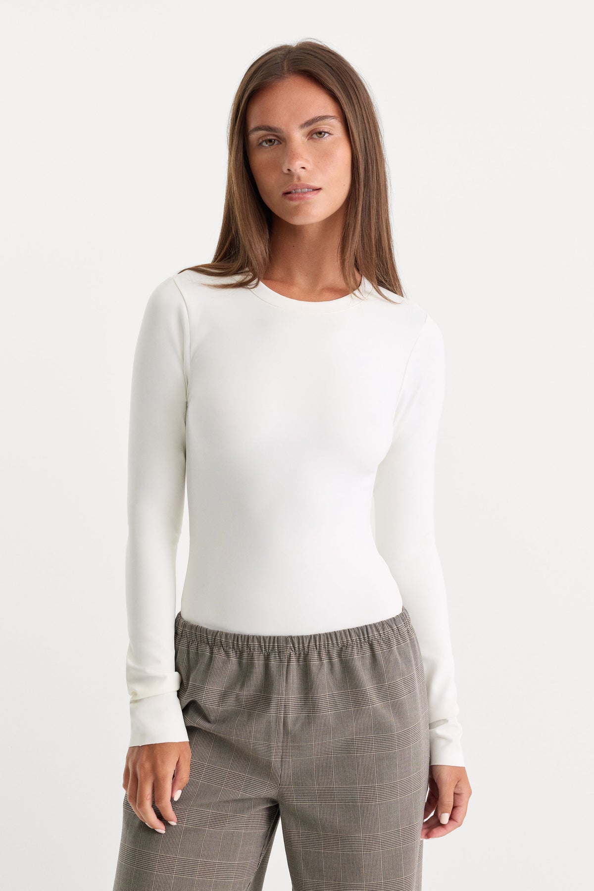 THE SCULPTING MODERN LONG SLEEVE BODYSUIT WHITE
